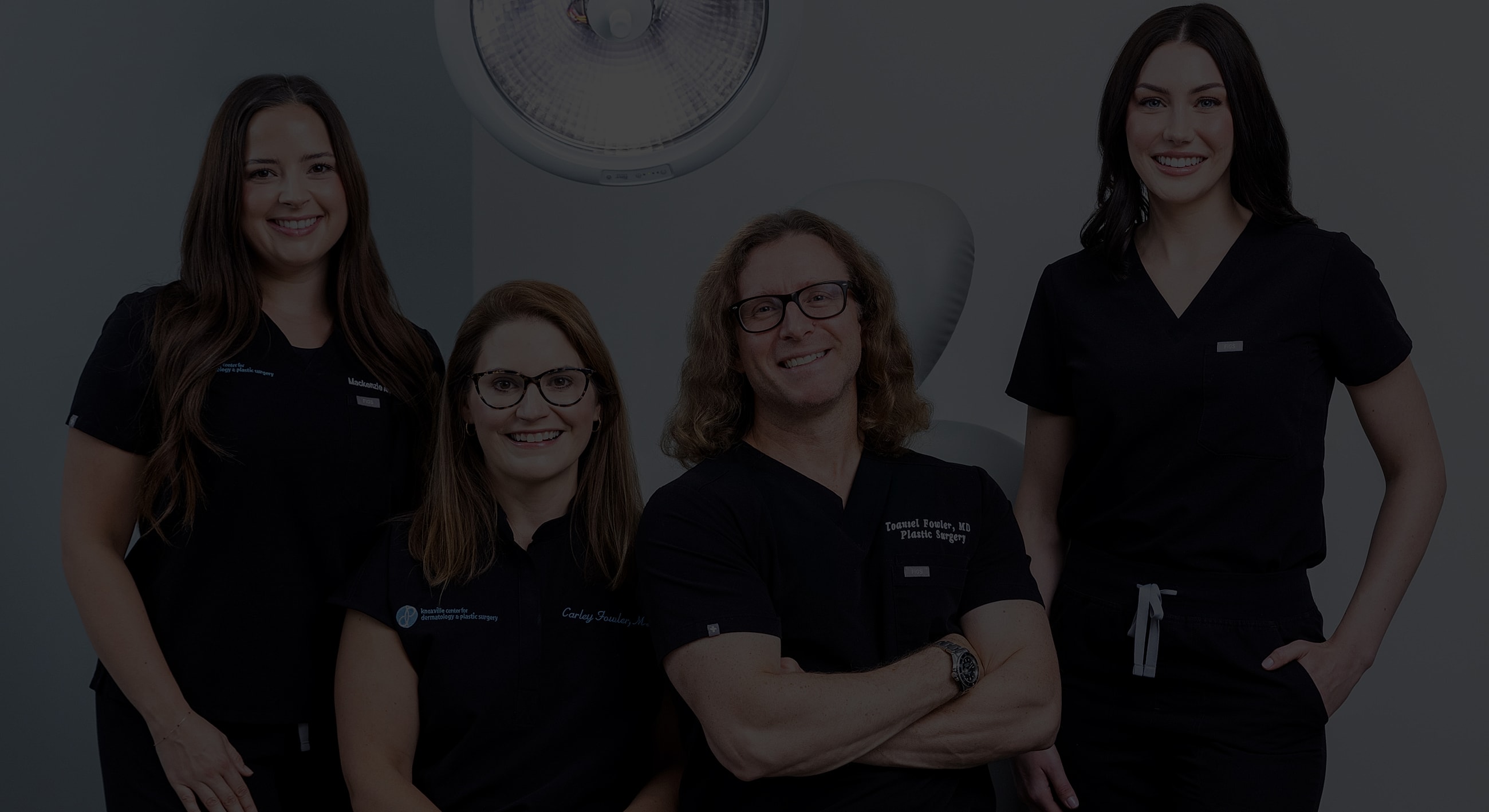 Plastic surgery team posing for a group photo
